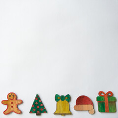 Christmas pattern with gingerbread man, tree, bell, santa hat and a gift