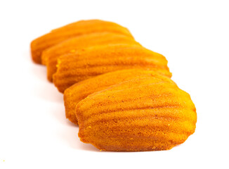 Orange Pumpkin Madeleine Cookies on a White Background