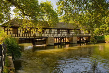 Fototapeta na wymiar Historic Truss Bridge (Water house) on the Neckar river, Esslingen, Baden-Württemberg, Germany.