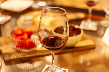 two glasses of red wine on the table