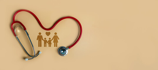 Top view of medical stethoscope and icon family on light orange background. Family health care insurance concept.
