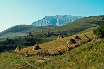 Haystack in the mountains on a clear day.