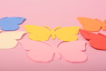 colorful butterflies on lilac background

