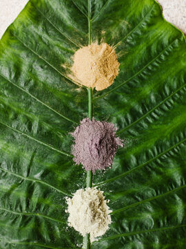 Herbal and spice powders used in body scrubs at a spa. Bali, Indonesia. Powders include turmeric, ginger, and clove.