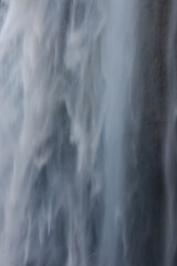 Fototapeta na wymiar Waterfall person iceland Seljalandsfoss