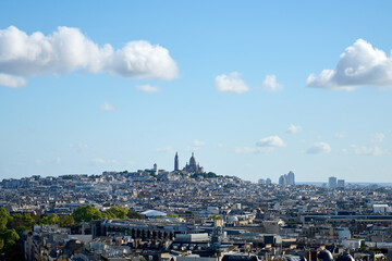 Mont Matte with Sacre Coeur in the middle of Paris, surrounded by buildings