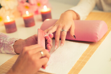 Obraz na płótnie Canvas Manicure process in beauty salon, making of artificial nails