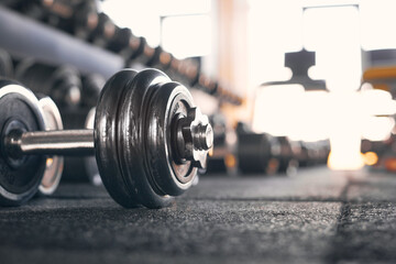 Rows of dumbbells in the gym Close up of modern dumbbells equipment in the sport gym, gym equipment concept