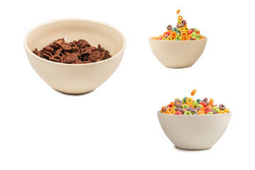 Chocolate corn flakes falling to the white bowl isolated on white. Motion.