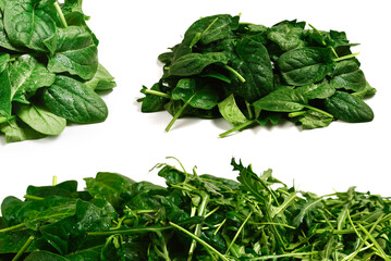 Fresh leaves of arugula and spinach as background.
