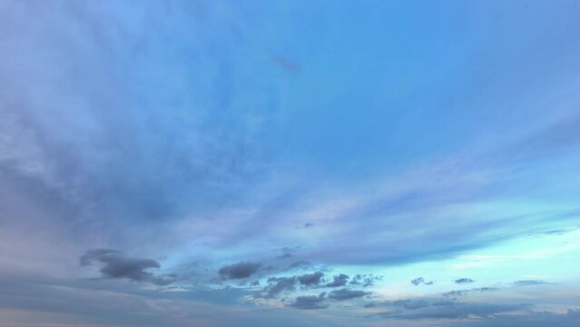 Autumn evening sky turning from near sunset to twilight. Time lapse of beautiful dusk moody sky shot at horizon line. Time-lapse of fast moving clouds. 4k timelapse of sky after the sunset.