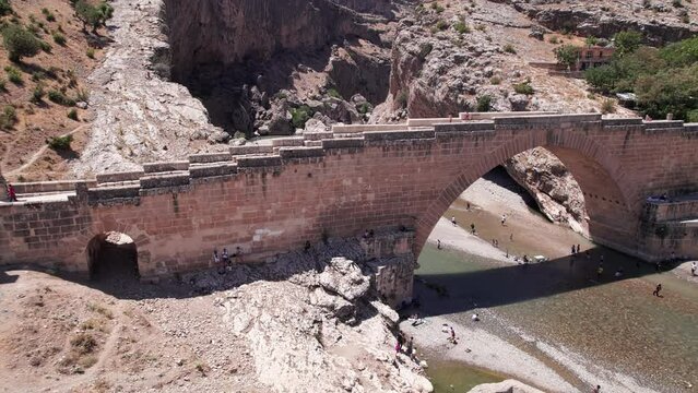 Aerial view of Severan Bridge and Chabinas creek at Adiyaman province, southeastern Anatolia, Turkey. Cendere bridge or Chabinas bridge is a late Roman bridge located near the ancient city of Arsameia
