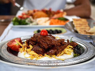 Still life turkish food in restaurant. Meat and kebab banner with shallow depth of field.