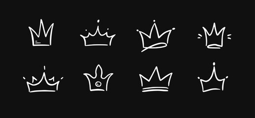 Fototapeta premium Doodle crown hand drawn set. Doodle princess crown, queen tiara. Line sketch royal element. Queen, king hand drawn simple design element. Isolated vector illustration.