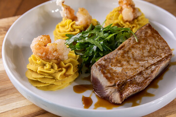 grilled tuna with mashed potatoes and shrimp