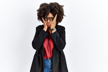 African american woman with afro hair wearing business jacket and glasses tired hands covering face, depression and sadness, upset and irritated for problem