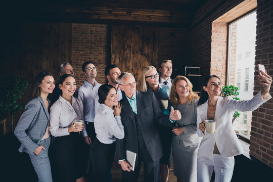 Portrait of group business partners make selfie recording video loft room modern office indoors
