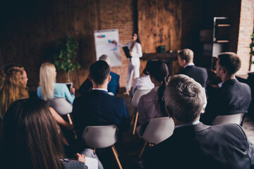 Businesspeople listening lecture attending business meeting finance plan report presentation at...