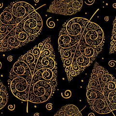 Golden autumn leaves on a black background in the style of luxury and jewels