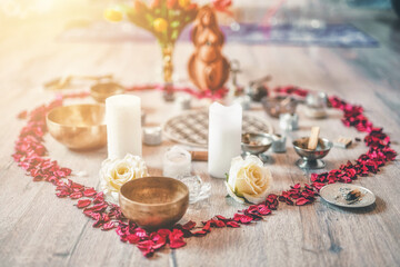 Beautiful altar with rose petals and goddess statuette. ceremony space. - obrazy, fototapety, plakaty