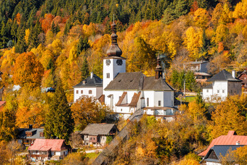 Church in The Spania Dolina village at autumn season, Slovakia, Europe. - obrazy, fototapety, plakaty