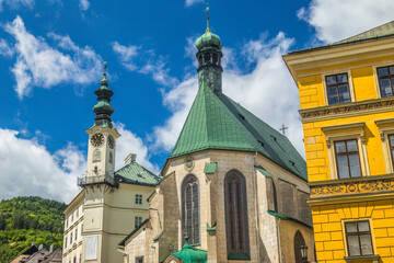 Obraz premium Town hall with St. Catherine's church in Banska Stiavnica, Slovakia, Europe.