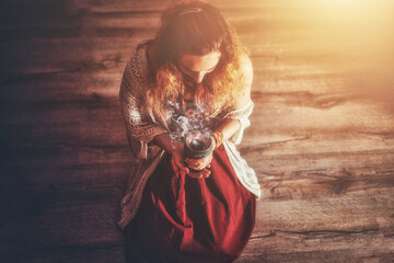 incense in a woman hand, ceremony space.