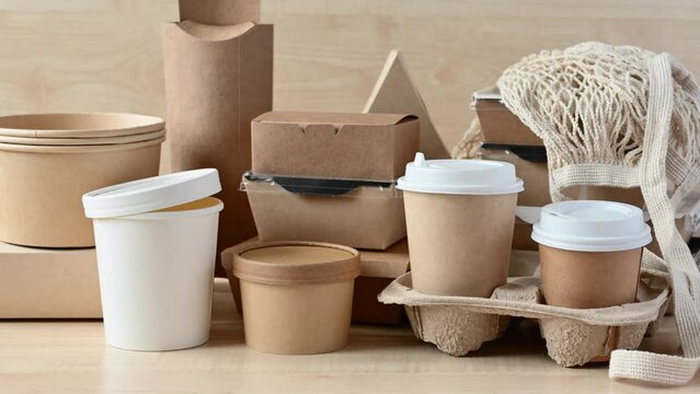Paper eco-friendly disposable tableware. A large set of dishes and packaging for fast food. 
