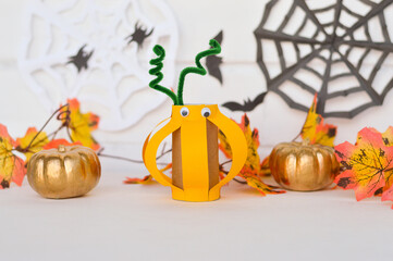 Halloween decoration from toilet paper roll, handmade pumpkin. easy paper crafts for kids.