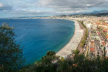 Fototapeta na wymiar Amazing view of coast of Nice and buildings (include Promenade des Anglais in Nice)