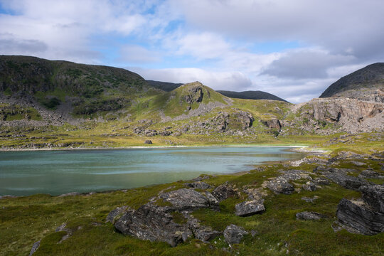 Wonderful landscapes in Norway. Nord-Norge. Beautiful scenery of Masoy coastline at Havoysund in the Troms og Finnmark. Cloudy day. Selective focus
