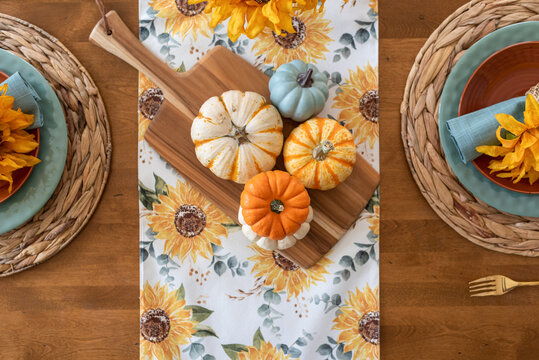 Top View Of Pretty Fall Tablescape With Colorful Pumpkins