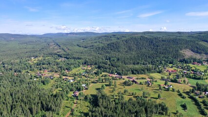 Fototapeta na wymiar survol des lacs suédois dans la région de Dalécarlie autour de la ville d'Älvdalen