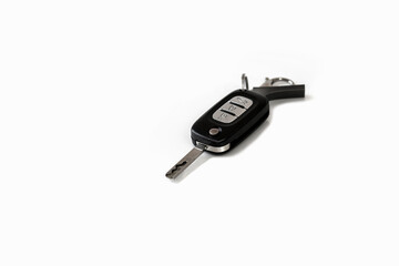 black controlled car key and metal enclosure key