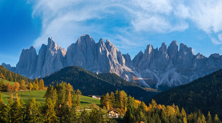 Autumn evening Santa Magdalena famous Italy Dolomites village surroundings in front of the Geisler...