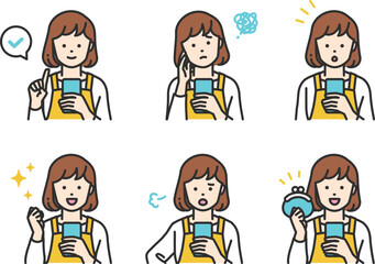 スマホを操作しているシンプルタッチのエプロン姿の主婦