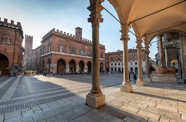 Piazza del Comune, Cremona: there are several historic buildings built with the typical Lombard red bricks and the cathedral. - obrazy, fototapety, plakaty