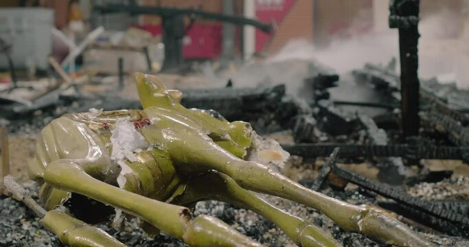 Remnants of doll statue left after burning at Las Fallas