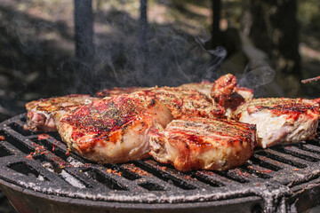 delicious grilled pork steaks on the barbecue