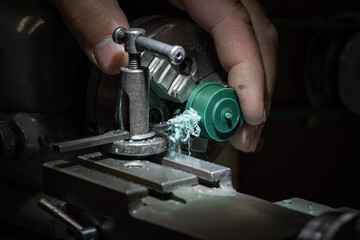 Fototapeta na wymiar jewelry workplace. Jeweler at work in gold ring. Desktop for craft jewelry making with professional tools. Close up view of tools.
