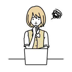 デスクで座ってPCを開いて困っている事務員制服の女性