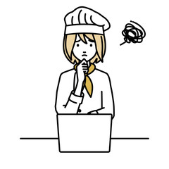 デスクで座ってPCを開いて困っている調理師の女性
