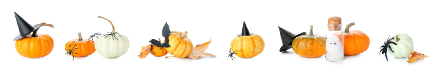 Group of autumn pumpkins with Halloween decorations on white background