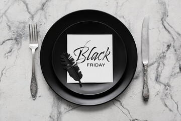 Table setting on light background. Black Friday sale