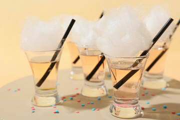 Shots with tasty cotton candy cocktail on board, closeup