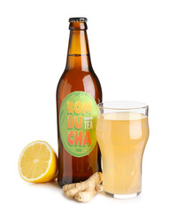 Bottle and glass of natural kombucha tea on white background