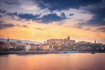 Fototapeta na wymiar Danube River view of the Buda Castle at dramatic sunset, Budapest, Hungary