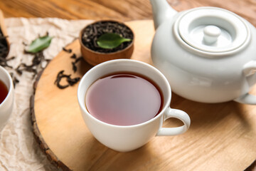 Obraz na płótnie Canvas Cup of hot black tea on table