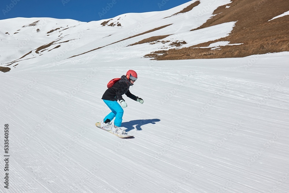 Canvas Prints Female snowboarder in the Alps