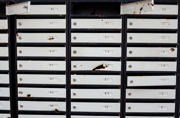Postboxes with bullet holes.